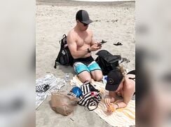 Dad bulge at the beach exposed